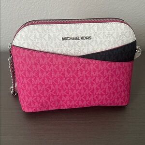 Michael kors crossbody pink with white and black accent. Silver hardware. New